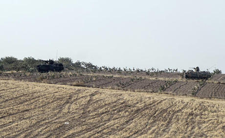 Turkish forces bombard northern Syria areas controlled by Kurdish militia